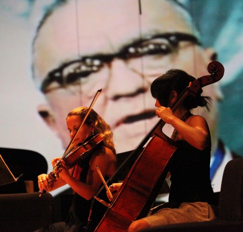 NWS Fellows perform at Lincoln Theatre with projected images - photo by Tomas Loewy