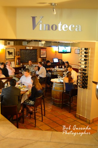 The wine cellar dining area below.